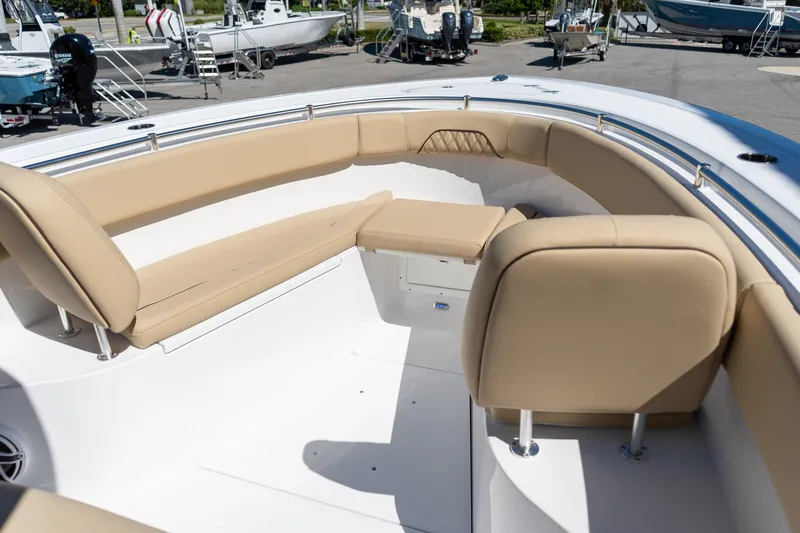Slide: The Image of 2026 Sportsman Open 282 Center Console boat with beige seating and spacious deck. - 53