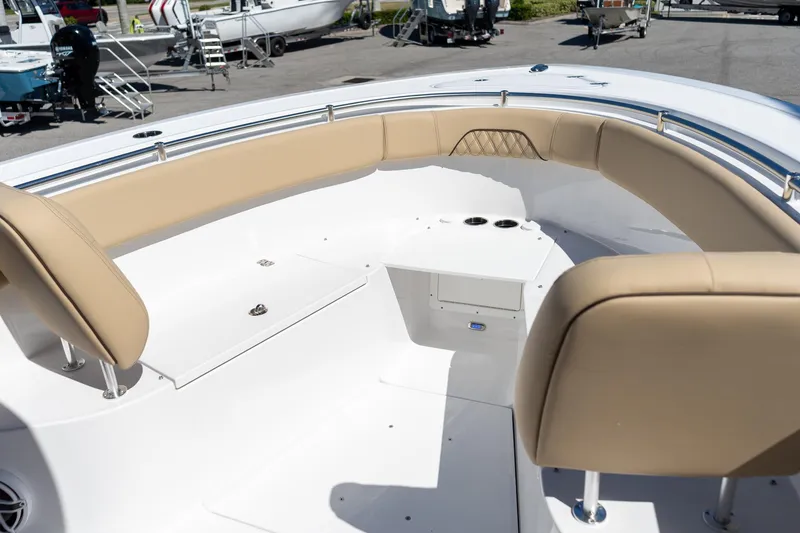 Slide: The Image of 2026 Sportsman Open 282 Center Console boat with tan seating and spacious deck. - 54