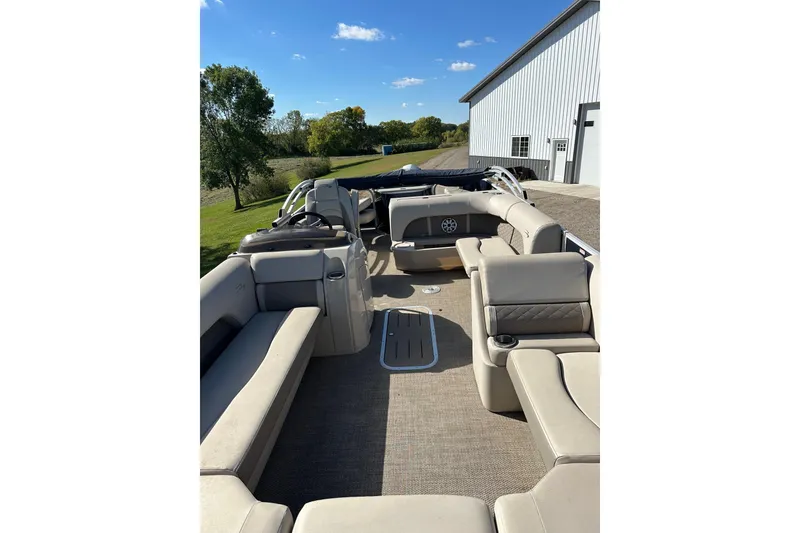 Slide: The Image of 2019 Bennington SX 22 Fishing boat interior with beige seating and open layout. - 15