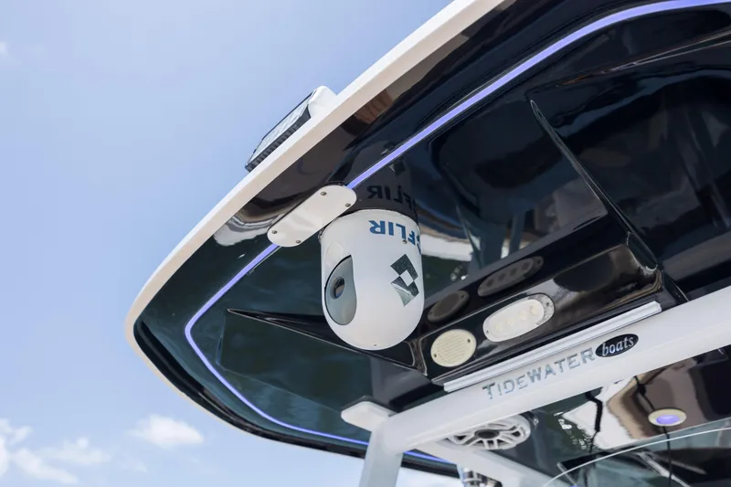 Slide: The Image of 2020 Tidewater 320 CC Adventure boat with advanced camera system under canopy. - 38
