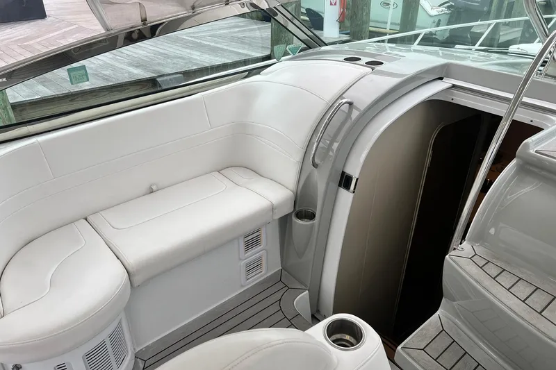 Slide: The Image of 2011 Formula 37 Performance Cruiser interior with white seating and cabin entrance. - 10
