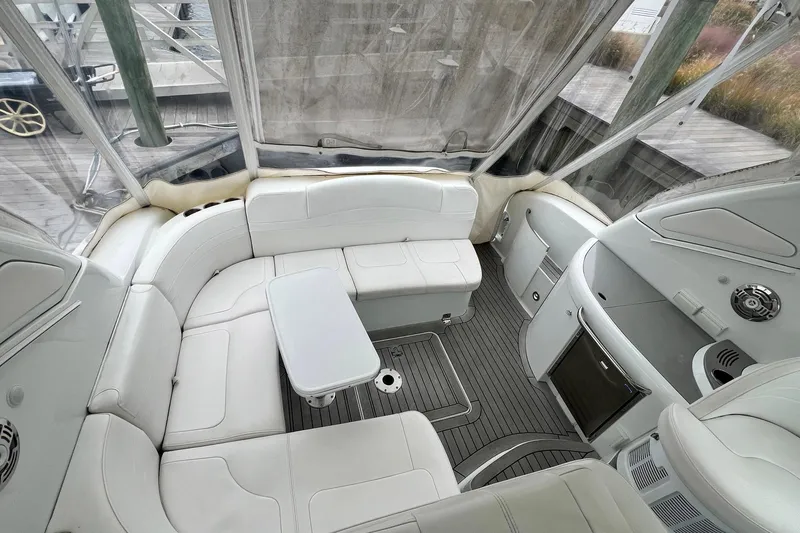 Slide: The Image of Luxurious interior of a 2011 Formula 37 Performance Cruiser with white seating and sleek design. - 12