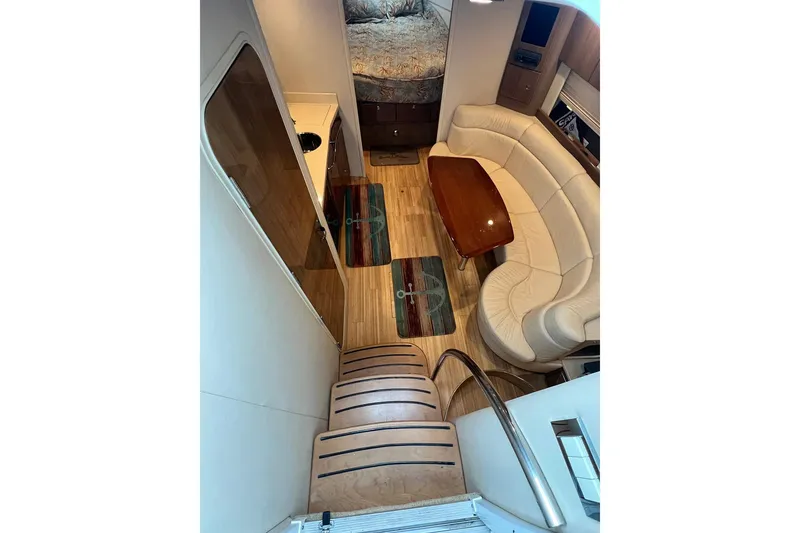 Slide: The Image of Interior of 2011 Formula 37 Performance Cruiser with elegant seating and wooden finishes. - 16