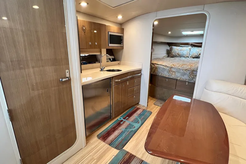 Slide: The Image of Interior of 2011 Formula 37 Performance Cruiser with kitchenette and cozy sleeping area. - 19