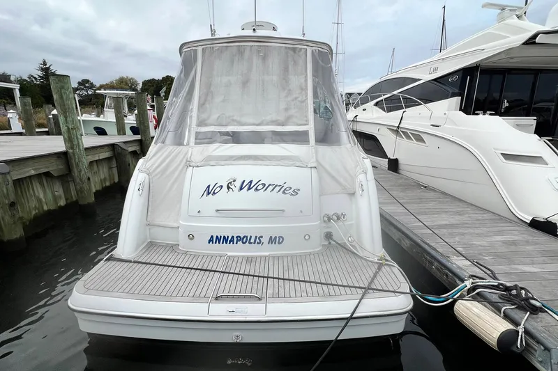 Slide: The Image of 2011 Formula 37 Performance Cruiser docked in Annapolis, MD, with "No Worries" on the stern. - 2