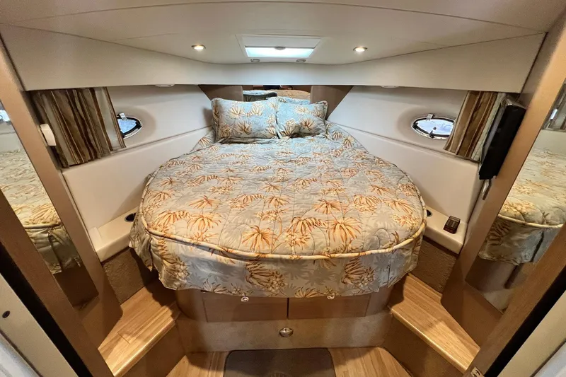 Slide: The Image of Luxurious cabin interior of 2011 Formula 37 Performance Cruiser with cozy bedding. - 24