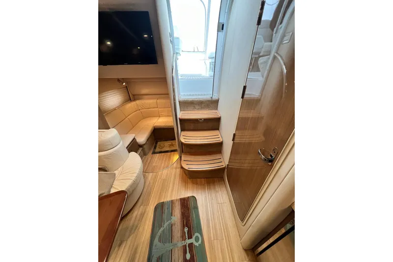 Slide: The Image of Interior of 2011 Formula 37 Performance Cruiser with cozy seating and wooden flooring. - 26