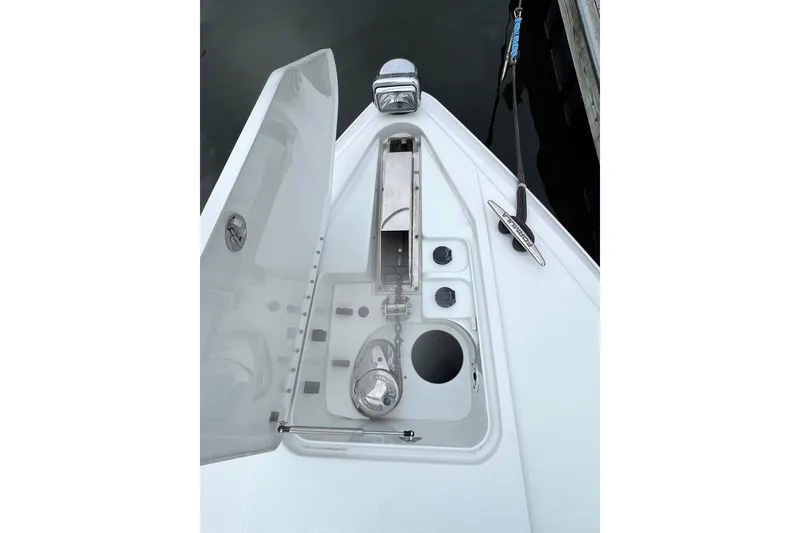 Slide: The Image of 2011 Formula 37 Performance Cruiser anchor compartment with open hatch and winch. - 33