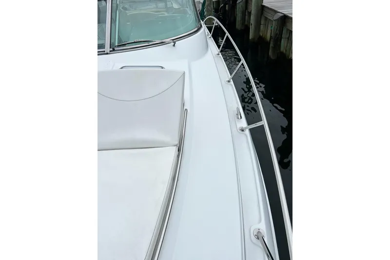 Slide: The Image of 2011 Formula 37 Performance Cruiser deck view by the dock. - 36