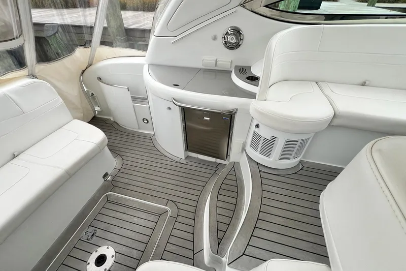 Slide: The Image of 2011 Formula 37 Performance Cruiser interior with white seating and sleek design. - 4