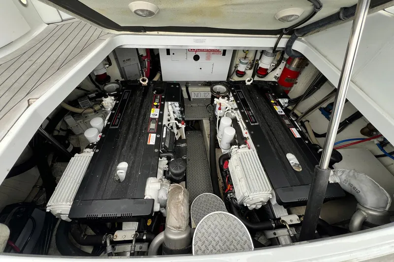 Slide: The Image of Engine compartment of a 2011 Formula 37 Performance Cruiser, showcasing dual engines. - 41