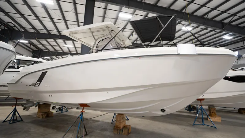 Slide: The Image of 2025 Beneteau Flyer 9 SPACEdeck boat in indoor storage facility. - 5