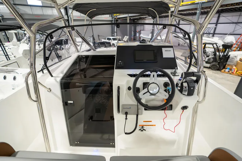 Slide: The Image of 2025 Beneteau Flyer 9 SPACEdeck helm with modern controls and navigation system. - 7