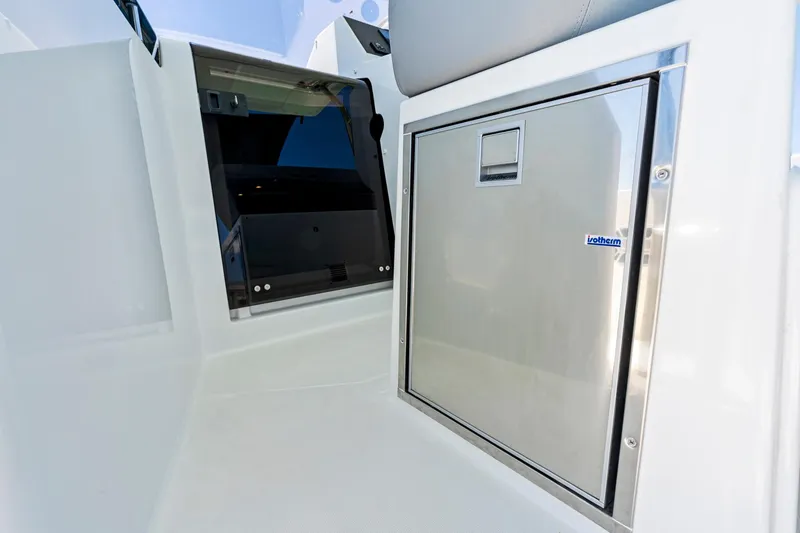 Slide: The Image of 2025 Beneteau Flyer 9 SUNdeck interior with sleek stainless steel cabinetry. - 10