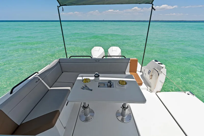 Slide: The Image of 2025 Beneteau Flyer 9 SUNdeck, luxurious seating area with ocean view. - 6