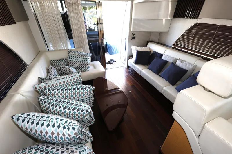 Slide: The Image of Luxurious interior of 2016 Sunseeker Manhattan 55 yacht with elegant seating and decorative pillows. - 13