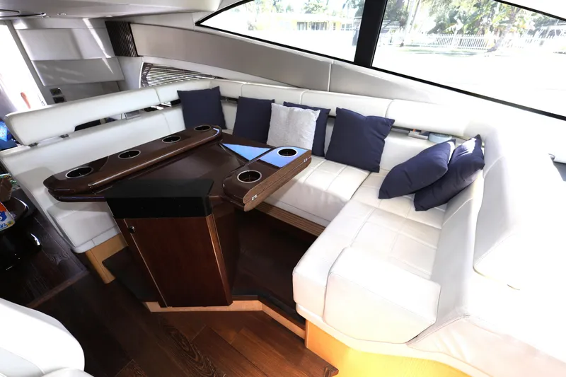 Slide: The Image of Luxurious interior of 2016 Sunseeker Manhattan 55 yacht with plush seating and elegant table. - 17