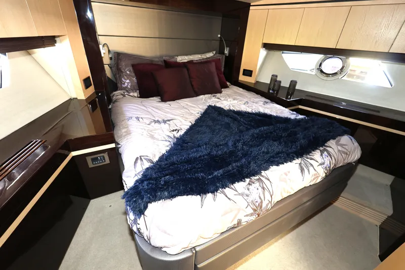 Slide: The Image of Luxurious bedroom interior of 2016 Sunseeker Manhattan 55 yacht with plush bedding. - 20