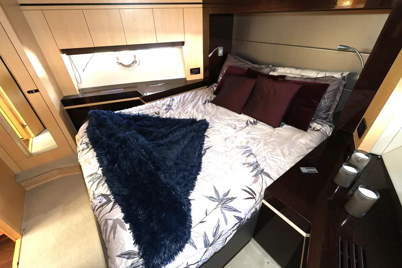 Slide: The Image of Luxurious bedroom interior of 2016 Sunseeker Manhattan 55 yacht with elegant bedding and decor. - 21