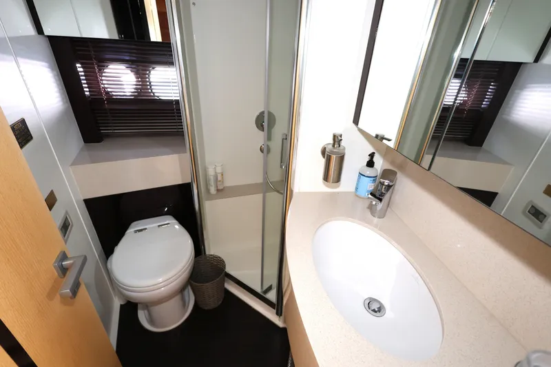 Slide: The Image of Luxurious bathroom in 2016 Sunseeker Manhattan 55 yacht with modern fixtures and shower. - 22