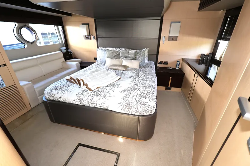 Slide: The Image of Luxurious bedroom interior of 2016 Sunseeker Manhattan 55 yacht with elegant decor. - 25