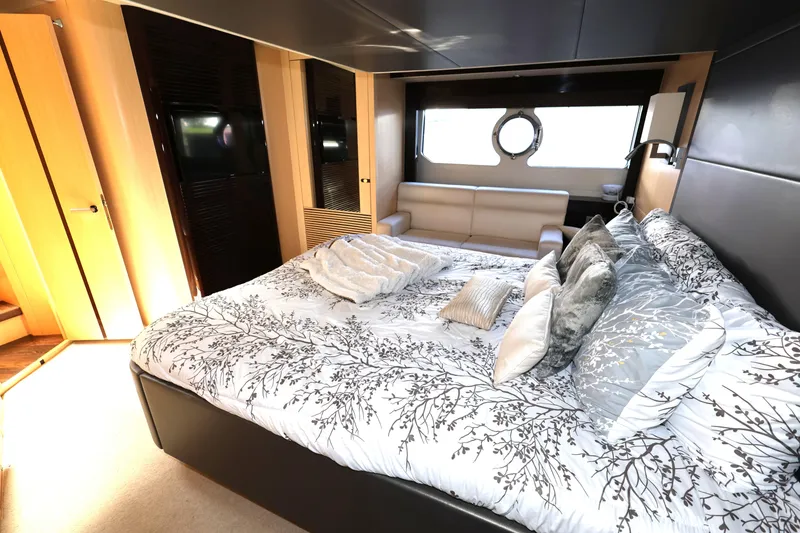 Slide: The Image of Luxurious bedroom interior of 2016 Sunseeker Manhattan 55 yacht with elegant bedding and decor. - 26