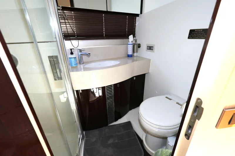 Slide: The Image of Luxurious bathroom in 2016 Sunseeker Manhattan 55 yacht with modern fixtures. - 28