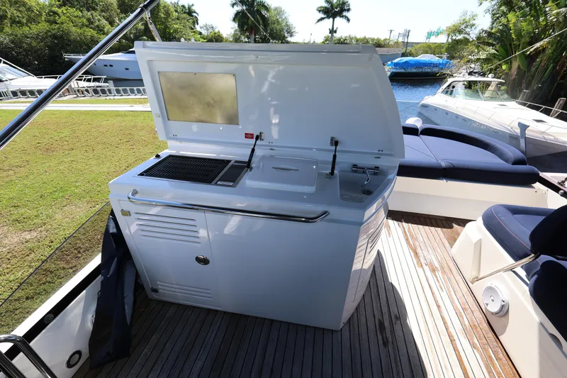 Slide: The Image of Outdoor kitchen on 2016 Sunseeker Manhattan 55 yacht with grill and sink. - 34