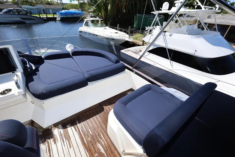 Slide: The Image of Luxurious 2016 Sunseeker Manhattan 55 yacht with elegant blue seating on deck. - 35