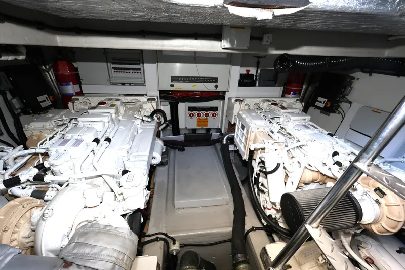 Slide: The Image of Engine room of 2016 Sunseeker Manhattan 55 yacht, featuring dual engines and equipment. - 39