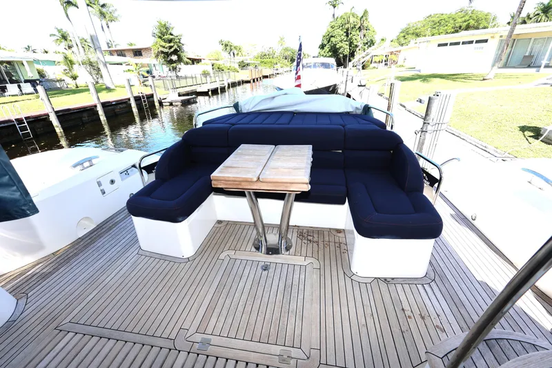 Slide: The Image of Luxurious 2016 Sunseeker Manhattan 55 yacht deck with seating and table. - 43