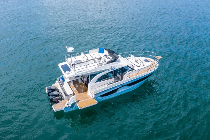 The Image of 2026 Beneteau Antares 11 Fly yacht on open water, showcasing sleek design and spacious deck. - 0