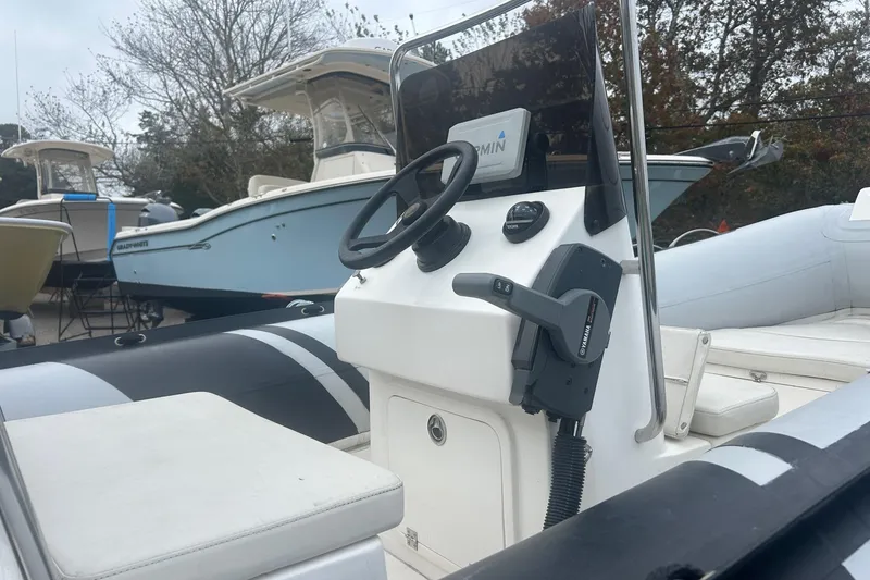 Slide: The Image of 2018 North Atlantic Inflatables RIB420 boat with outboard motor on trailer. - 4