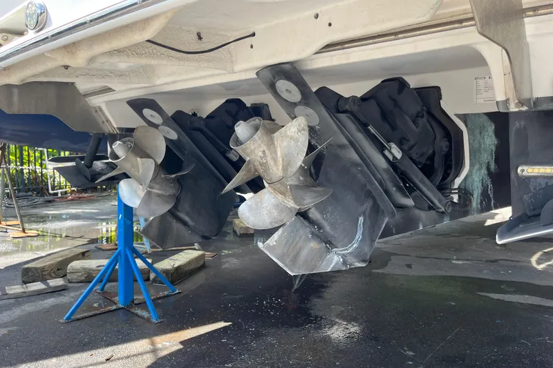 Slide: The Image of 2014 Regal 3200 Bowrider boat propellers and stern drive on display. - 38