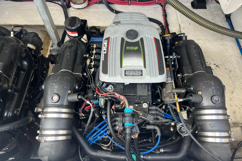 Slide: The Image of 2014 Regal 3200 Bowrider engine compartment with 350 MAG engine components. - 42