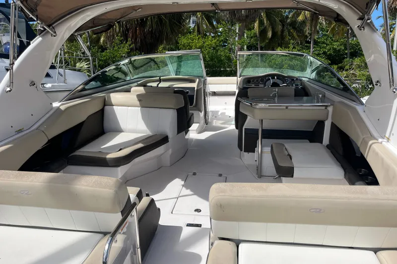 Slide: The Image of 2014 Regal 3200 Bowrider interior with spacious seating and modern design. - 5