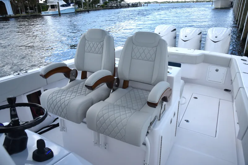 Slide: The Image of Luxury seating on 2025 Jupiter 380 LS boat, featuring elegant design and waterfront view. - 6
