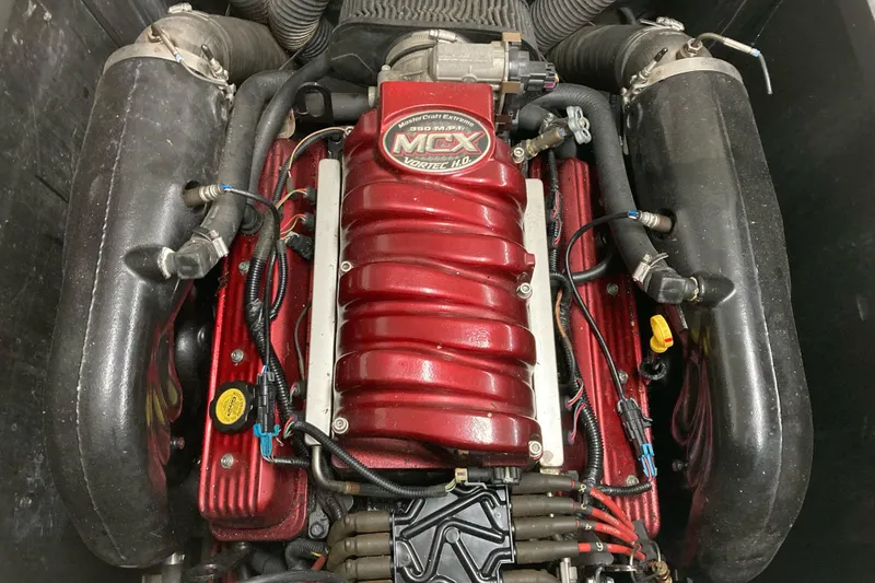 Slide: The Image of 2008 MasterCraft MariStar 215 engine with red MCX Vortec HO cover. - 15