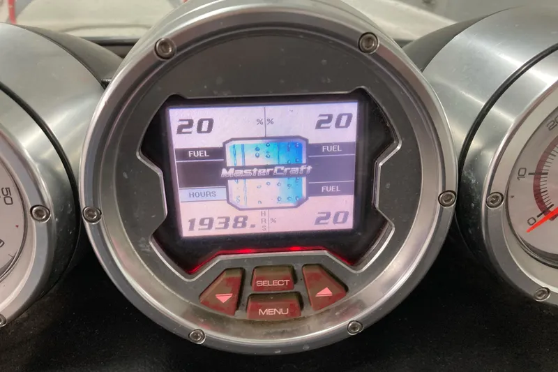 Slide: The Image of Dashboard of 2008 MasterCraft MariStar 215 showing fuel levels and engine hours. - 16