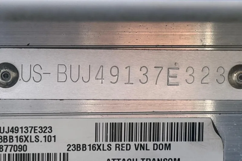 Slide: The Image of 2023 Sun Tracker Bass Buggy 16 XL serial number plate with barcode and identification details. - 25