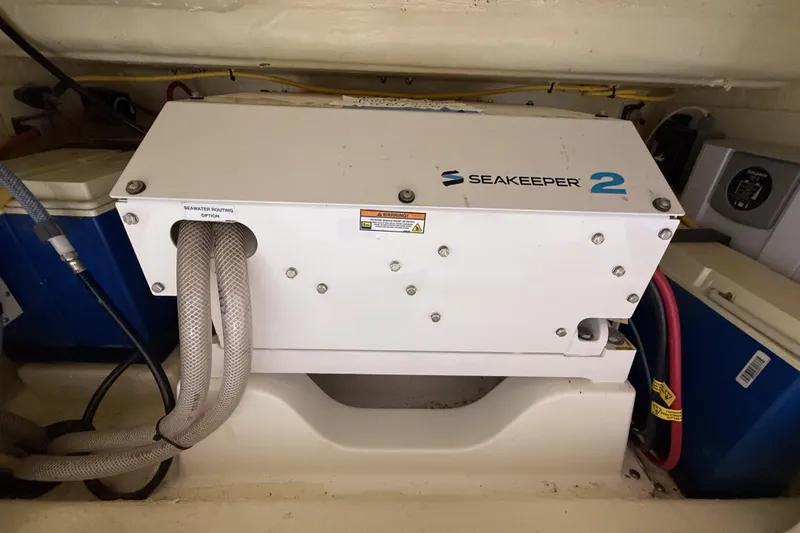 Slide: The Image of Seakeeper 2 gyrostabilizer in 2021 Cobia 350 CC boat engine room. - 14