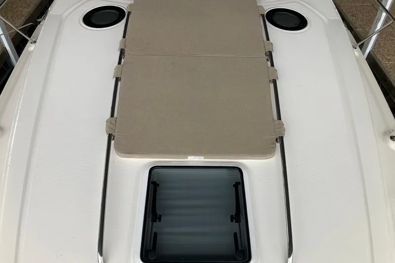 Slide: The Image of 2004 Sea Ray 320 Sundancer boat deck with sunpad and hatch. - 23