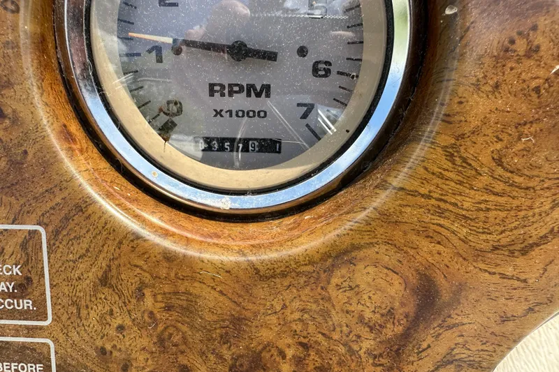 Slide: The Image of Close-up of RPM gauge on 2003 Crest 25 II LM boat dashboard. - 11