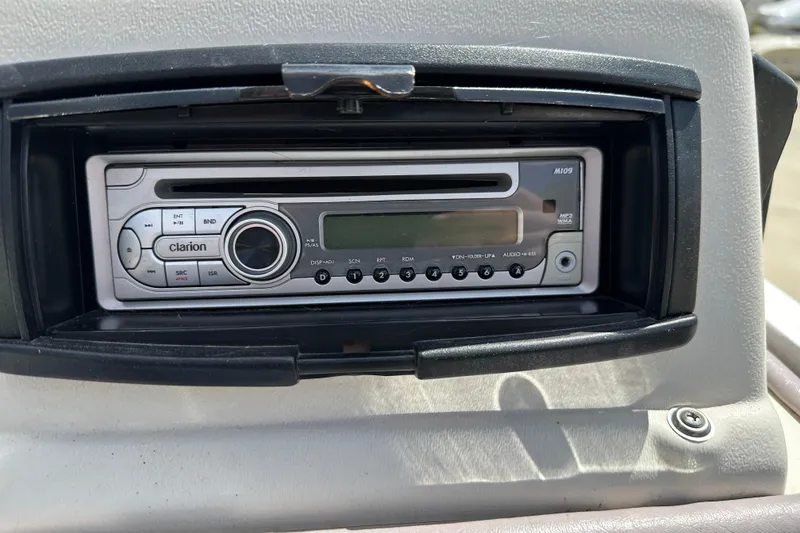 Slide: The Image of 2003 Crest 25 II LM boat stereo system, featuring a Clarion M109 unit. - 12