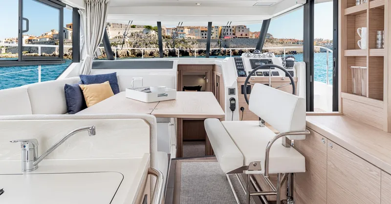 Slide: The Image of Interior of 2025 Beneteau Swift Trawler 41 Fly, featuring modern design and spacious seating. - 2