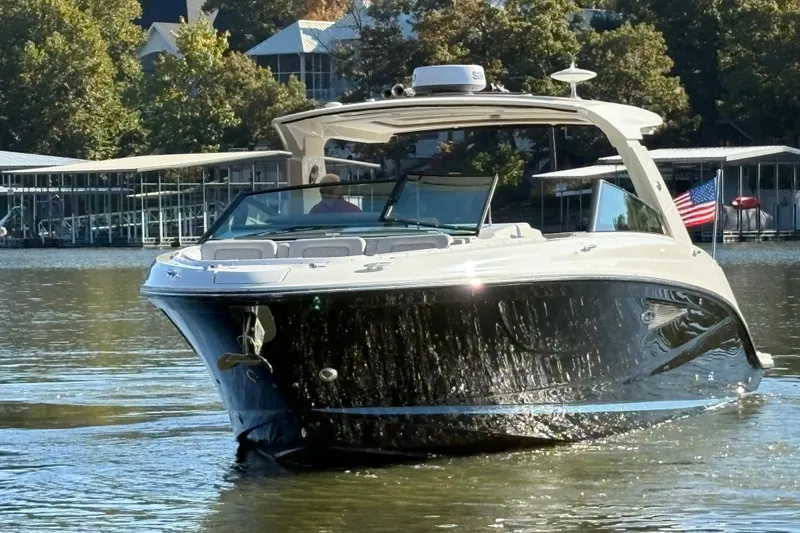 Slide: The Image of ```markdown Ozark Yachts & Motorsports logo, featuring Sea Ray SLX 400, 2023 model. ``` - 1