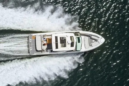 Slide: The Image of Manufacturer Provided Image: 2023 Sea Ray SLX 400 boat cruising on water with passengers. - 15