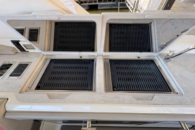 Slide: The Image of Manufacturer Provided Image: Luxurious 2023 Sea Ray SLX 400 boat interior with plush seating and scenic water view. - 31