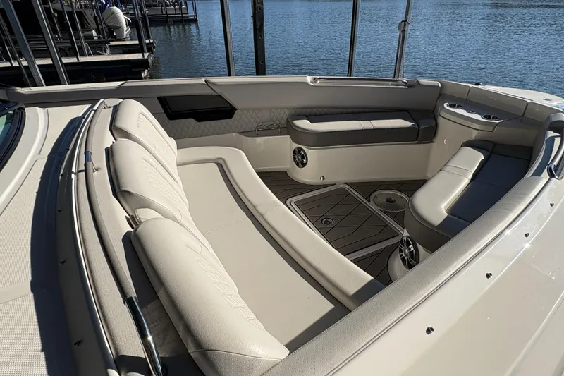 Slide: The Image of 2023 Sea Ray SLX 400 boat kitchen with grill and sink setup. - 34