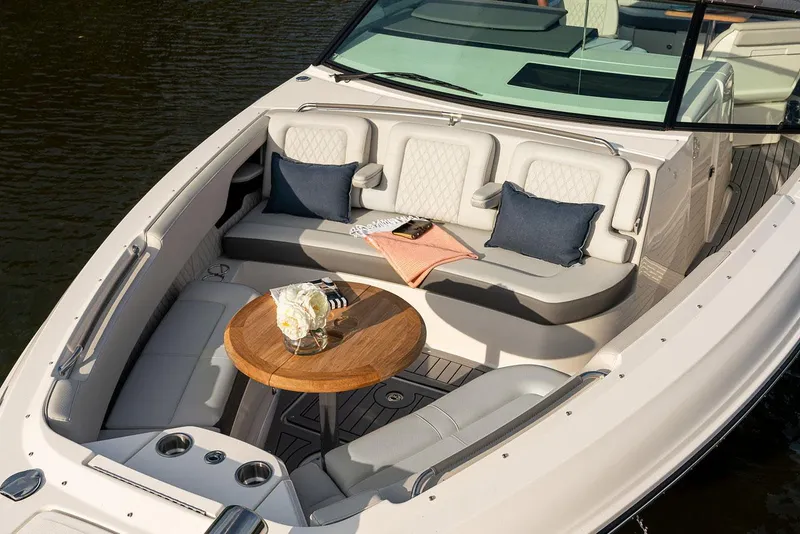 Slide: The Image of Manufacturer Provided Image: 2023 Sea Ray SLX 400 luxury boat interior with dining table and seating. - 36